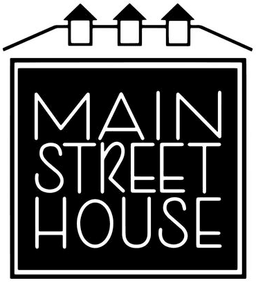 Logo featuring the text "MAIN STREET HOUSE" with three rooftops above.